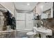 The full bathroom includes a shower-tub combo and a pedestal sink, providing essential functionality at 7350 Gold King Way, Indianapolis, IN 46259