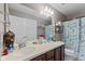 Spacious bathroom with double sink vanity and decorative mirror at 7350 Gold King Way, Indianapolis, IN 46259