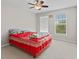 Bright bedroom featuring a ceiling fan and natural light from two windows at 7350 Gold King Way, Indianapolis, IN 46259