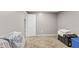 An unfinished storage room with carpet provides lots of storage opportunities at 7350 Gold King Way, Indianapolis, IN 46259