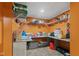 The unfinished storage room features sturdy shelving for optimized organization and accessibility at 7350 Gold King Way, Indianapolis, IN 46259