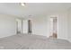 Bedroom with neutral carpet, access to closet and en suite bathroom at 7572 Wymm Ln, Ingalls, IN 46048