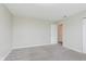 Bedroom with neutral carpet and access to hall and closet at 7572 Wymm Ln, Ingalls, IN 46048