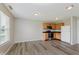 Kitchen with oak cabinets, vinyl plank flooring, and neutral paint throughout at 7572 Wymm Ln, Ingalls, IN 46048