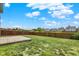 Large fenced backyard features a wooden deck, perfect for outdoor entertaining and play at 7865 Danube St, Indianapolis, IN 46239