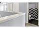 Upstairs bathroom featuring a decorative shower curtain, a dual-flush toilet, and a neutral color palette at 7865 Danube St, Indianapolis, IN 46239