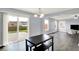 Dining area with sliding glass doors opening to the backyard and patio at 7865 Danube St, Indianapolis, IN 46239