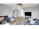 Spacious living area with ample seating and natural light at 7865 Danube St, Indianapolis, IN 46239