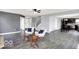 Open-concept living room with modern furniture and a combined kitchen at 7865 Danube St, Indianapolis, IN 46239