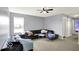 Comfortable living room with carpet and a ceiling fan at 7865 Danube St, Indianapolis, IN 46239