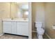 Bathroom with toilet and double sink at 8047 Red Barn Cir, Indianapolis, IN 46239