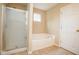 Bathroom with shower and tub at 8047 Red Barn Cir, Indianapolis, IN 46239