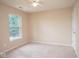 Bedroom with window and door at 8047 Red Barn Cir, Indianapolis, IN 46239