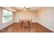 Bright dining area with hardwood floors and natural light at 8047 Red Barn Cir, Indianapolis, IN 46239