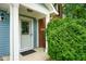 Close-up of the front door and porch, showcasing a neat entrance with a 'No Soliciting' sign at 8047 Red Barn Cir, Indianapolis, IN 46239