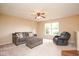 Comfortable living room with plush seating and a view to the backyard at 8047 Red Barn Cir, Indianapolis, IN 46239