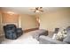 Open-concept living room with plush seating and hardwood floors at 8047 Red Barn Cir, Indianapolis, IN 46239