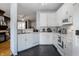 Bright kitchen featuring white cabinets, modern appliances, and a functional layout for easy meal preparation at 9525 Longwell Dr, Indianapolis, IN 46240