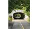 Scenic view of the Monon Trail tunnel surrounded by lush greenery, perfect for walking and biking at 9525 Longwell Dr, Indianapolis, IN 46240