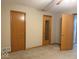 This carpeted bedroom features two closets and windows at 989 Plaza Dr, Martinsville, IN 46151