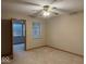 A bedroom featuring carpeting and a window is viewed from the doorway at 989 Plaza Dr, Martinsville, IN 46151