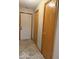 Hallway view with three doors and tile flooring at 989 Plaza Dr, Martinsville, IN 46151