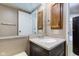 Bright bathroom with a single sink vanity and neutral walls at 10065 E 25Th St, Indianapolis, IN 46229