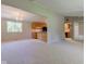 Open-concept living area seamlessly connects to the kitchen, offering a modern living experience at 10065 E 25Th St, Indianapolis, IN 46229