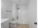 Clean bathroom with tub-shower combination and tile flooring at 10222 Arapahoe Dr, Indianapolis, IN 46235
