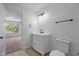 Bathroom featuring vanity and tile flooring with walk in shower at 10222 Arapahoe Dr, Indianapolis, IN 46235