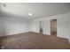 Large bedroom with carpet floors and access to ensuite bathroom and closet at 10222 Arapahoe Dr, Indianapolis, IN 46235