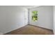 Bedroom with plush carpet, white walls and natural lighting at 10222 Arapahoe Dr, Indianapolis, IN 46235
