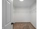 Walk-in closet with carpet flooring and wire shelving for storage at 10222 Arapahoe Dr, Indianapolis, IN 46235