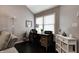 Comfortable office featuring a wooden desk, chair, and a window for natural light at 1106 Barbara Dr, Greenwood, IN 46143
