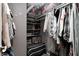Organized walk-in closet with ample shelving and hanging space, providing plenty of storage solutions at 1106 Barbara Dr, Greenwood, IN 46143