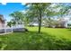 Expansive backyard with well-kept lawn, a gazebo, and a modern barn at 11250 N 600 W, Fountaintown, IN 46130