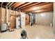 Spacious unfinished basement with exposed beams, tile floor, and utility systems at 11250 N 600 W, Fountaintown, IN 46130