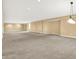 Spacious basement featuring neutral walls and carpet, complemented by modern recessed lighting and offering versatile space at 11250 N 600 W, Fountaintown, IN 46130