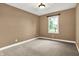 Cozy bedroom with natural light and plush carpeting at 11250 N 600 W, Fountaintown, IN 46130