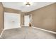 Spacious bedroom with double closets and neutral carpet flooring at 11250 N 600 W, Fountaintown, IN 46130