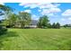 Gorgeous single story home surrounded by lush, green lawn and mature trees on a picturesque lot at 11250 N 600 W, Fountaintown, IN 46130