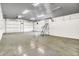 Expansive garage area with concrete floors, white walls, and high ceilings providing lots of space at 11250 N 600 W, Fountaintown, IN 46130