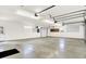 Clean and bright three-car garage with ample space and white walls, great for parking and storage at 11250 N 600 W, Fountaintown, IN 46130