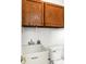 Convenient utility sink with storage cabinet, perfect for cleaning up messes or completing projects at 11250 N 600 W, Fountaintown, IN 46130