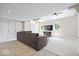 Finished basement features a large sectional, recessed lights, and dual ceiling fans at 11424 Green St, Carmel, IN 46033