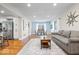 Open-concept living room flows into the dining area and kitchen at 11424 Green St, Carmel, IN 46033