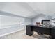 Home office featuring carpeted floors, large desk and a large window at 11424 Green St, Carmel, IN 46033