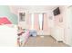 Bright bedroom with a bed, dresser, and curtains at 1156 Brockton Ct, Greenfield, IN 46140