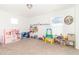 Bonus room featuring a play kitchen, toys and games providing an area for entertainment at 1156 Brockton Ct, Greenfield, IN 46140