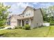 Inviting two-story home with a well-manicured lawn and an attached two car garage at 1156 Brockton Ct, Greenfield, IN 46140